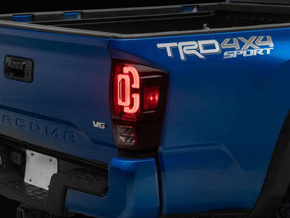 Raxiom 16-23 Toyota Tacoma XW Series Sequential LED Tail Lights- Black Housing- Red Lens
